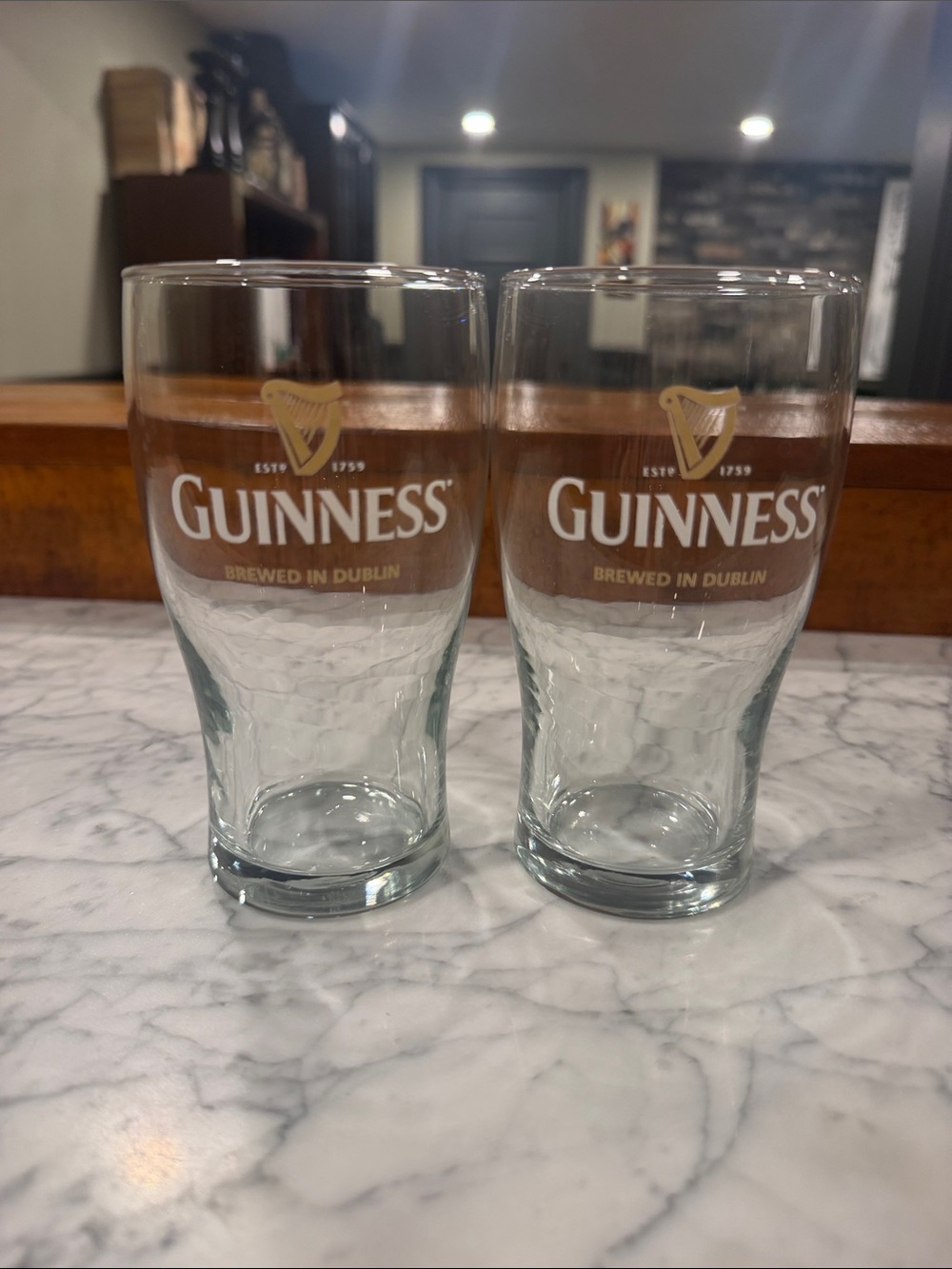 Guinness Clear Pint Glasses with White and Gold Logos - Set of 2